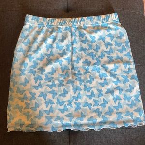 Blue and white butterfly mini skirt from Amazon. Size small. NWT.
